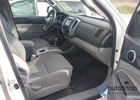 2015 Toyota Tacoma Base V6 z USA, uszkodzony, nr VIN 3TMMU4FN0FM083581